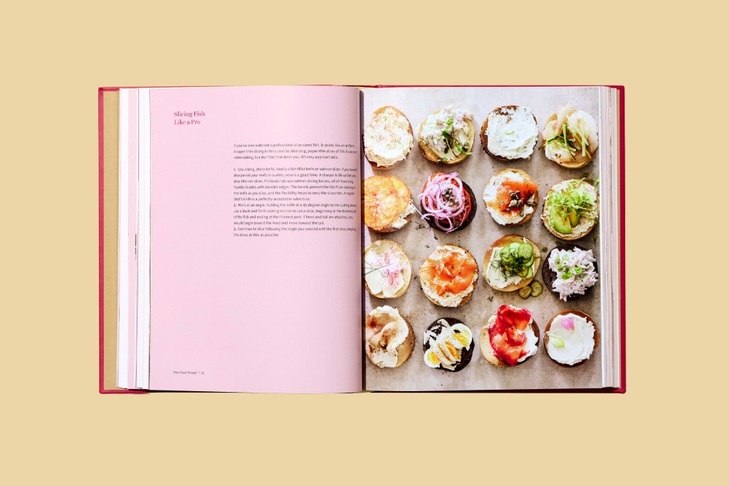 Open the cookbook with various food items on display