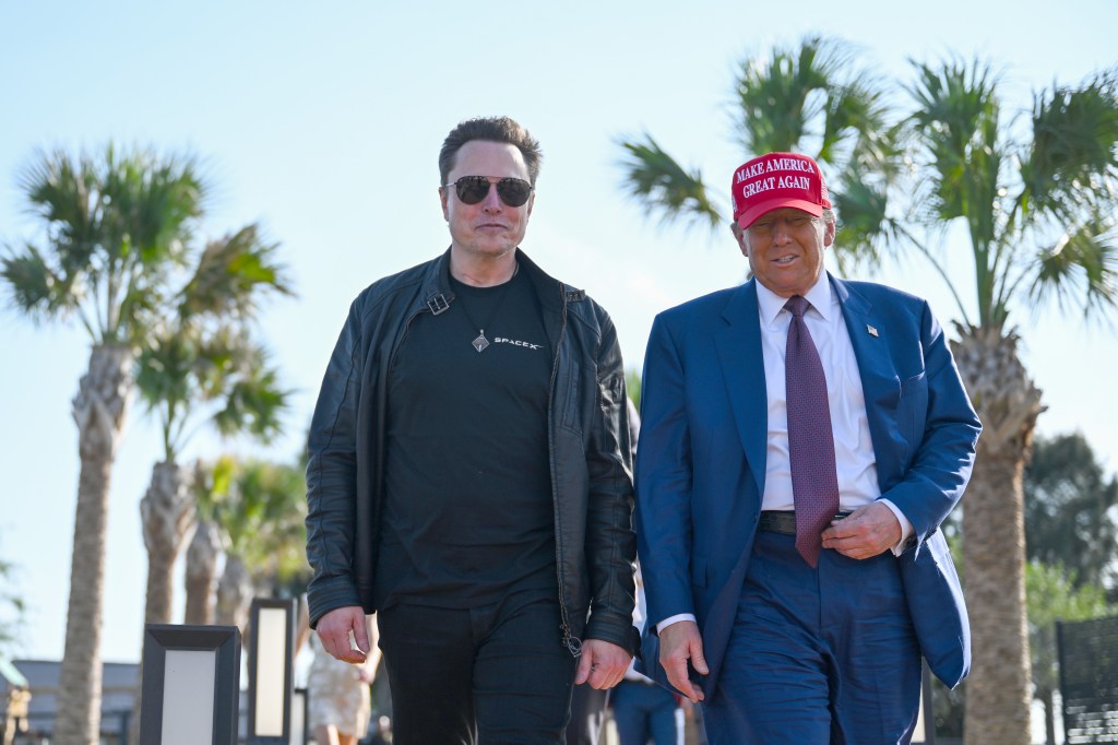 Elon Musk with Donald Trump last month.